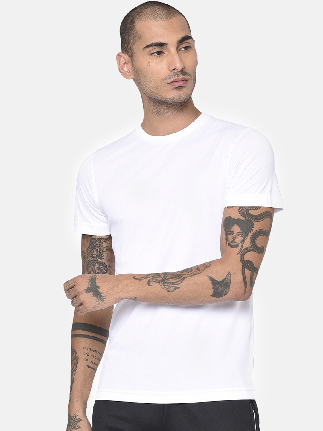 

Puma Men White Solid Round Neck T-shirt