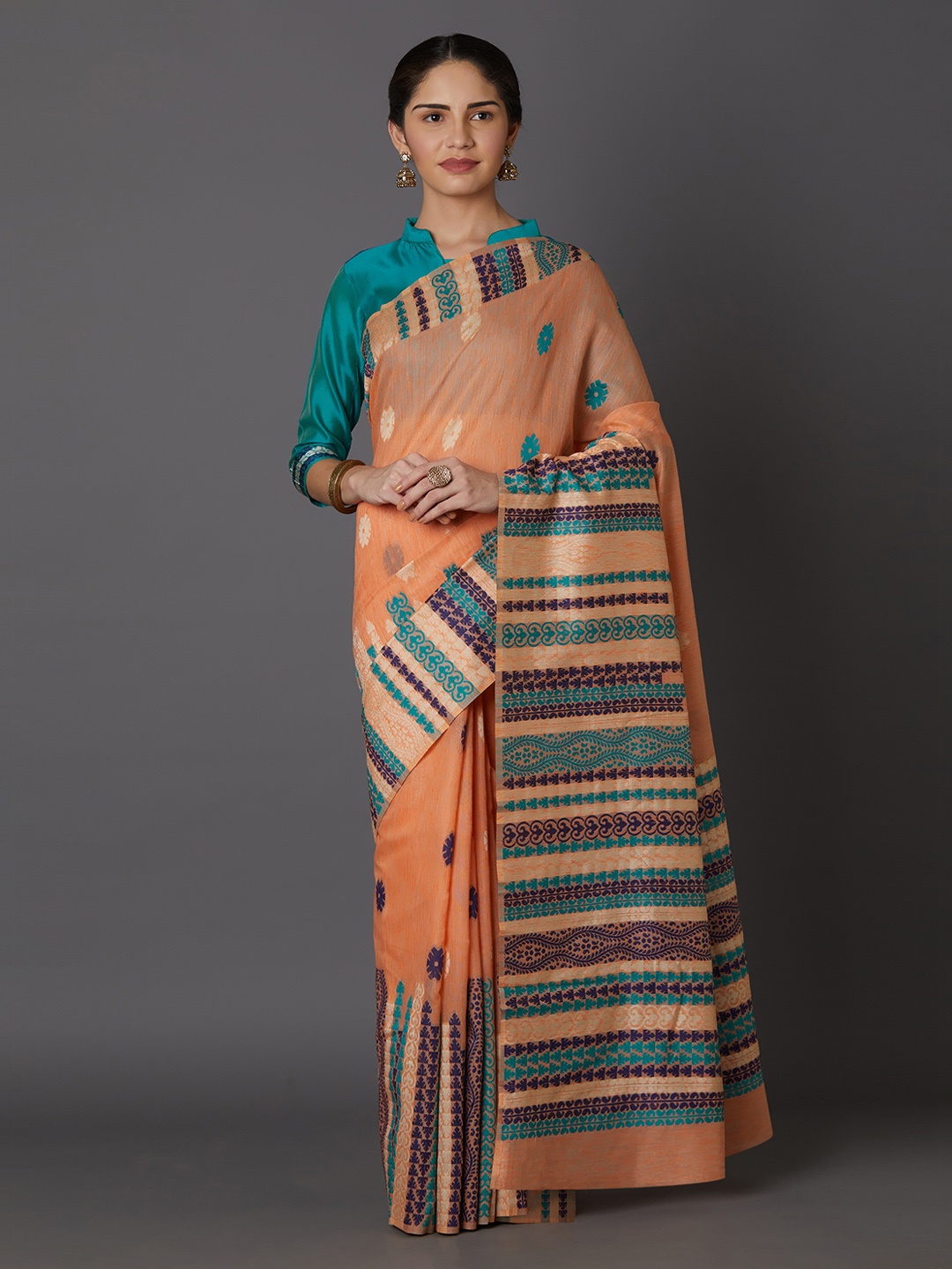 

Mitera Coral Orange & Turquoise Blue Silk Blend Woven Design Kanjeevaram Saree