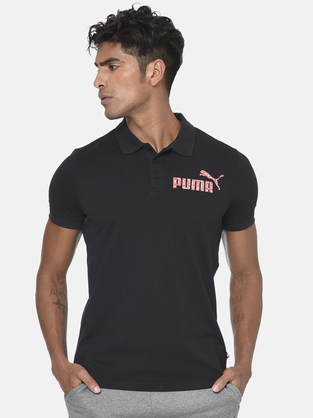 

Puma Men Black Graphic Printed Polo Collar T-shirt
