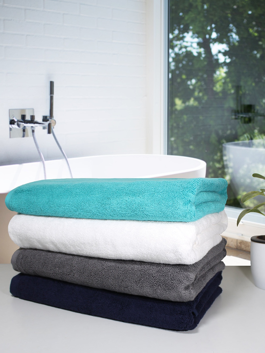 

Heelium Set of 4 Solid 600GSM Quick Absorbent Bath Towels, Multi