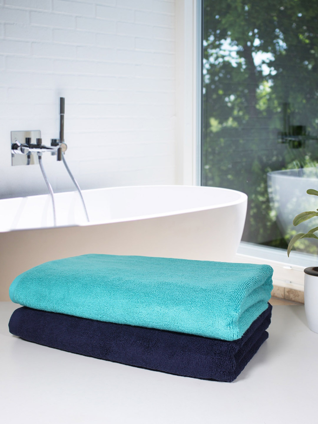 

Heelium Set of 2 Blue & Teal Blue Solid 600GSM Quick Absorbent Bath Towels