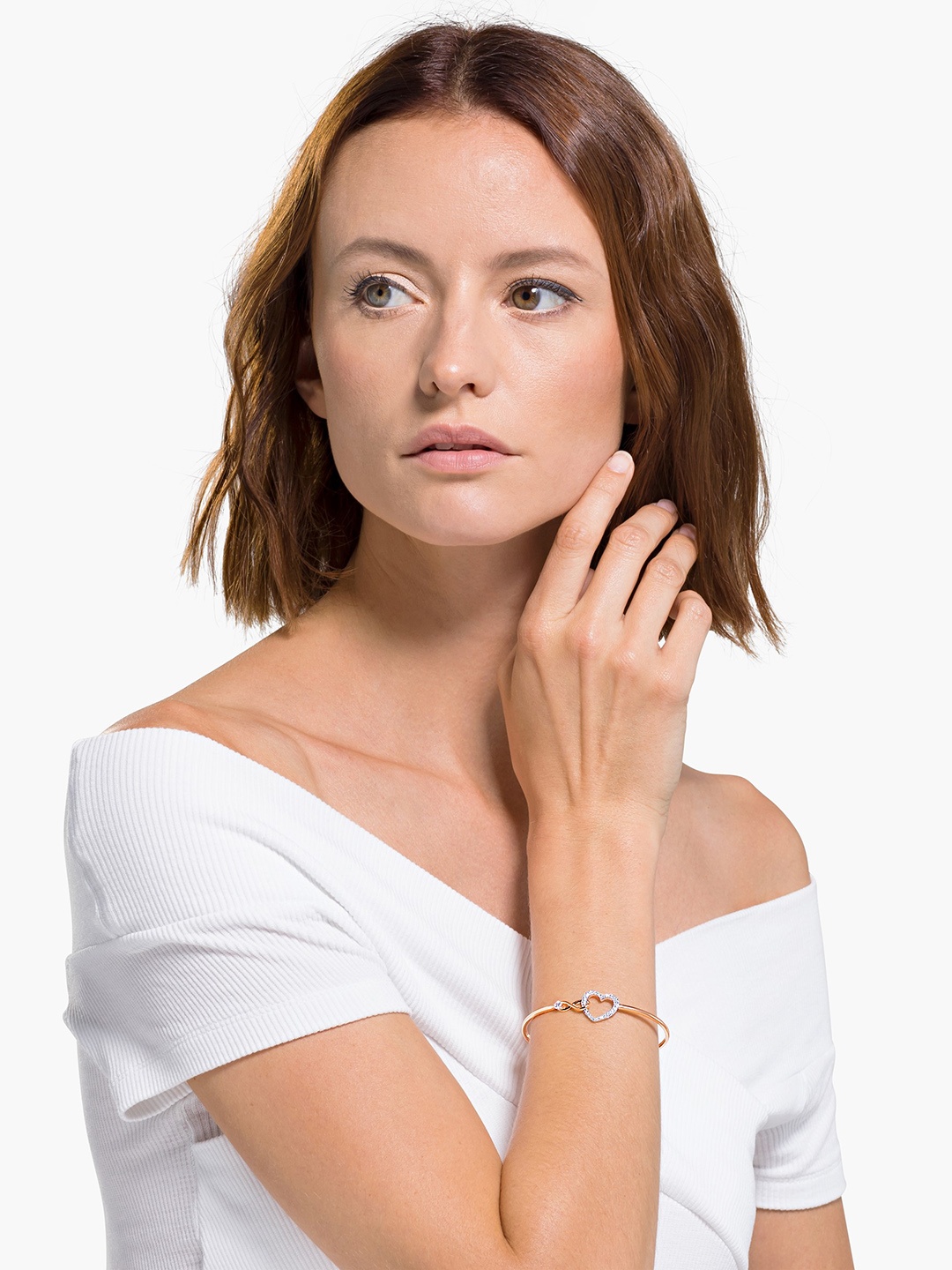 

SWAROVSKI White Mixed Metal Finish Infinity Heart Bangle