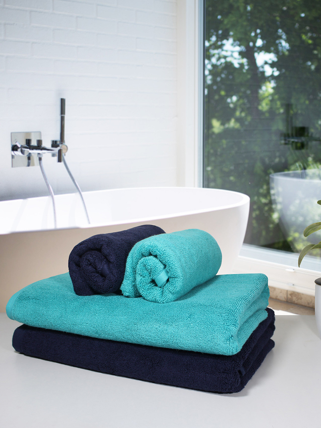 

Heelium Set of 4 Blue & Teal Blue 600GSM Quick Absorbent Bamboo Cotton Hand & Bath Towels