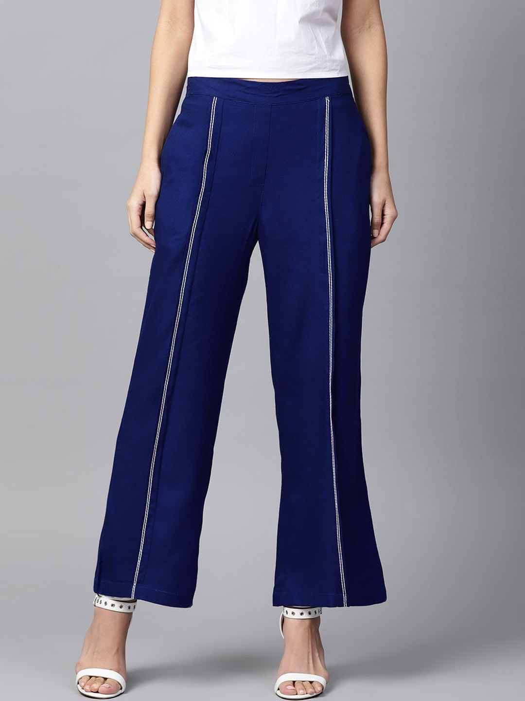 

Nayo Women Navy Blue Solid Flared Palazzos