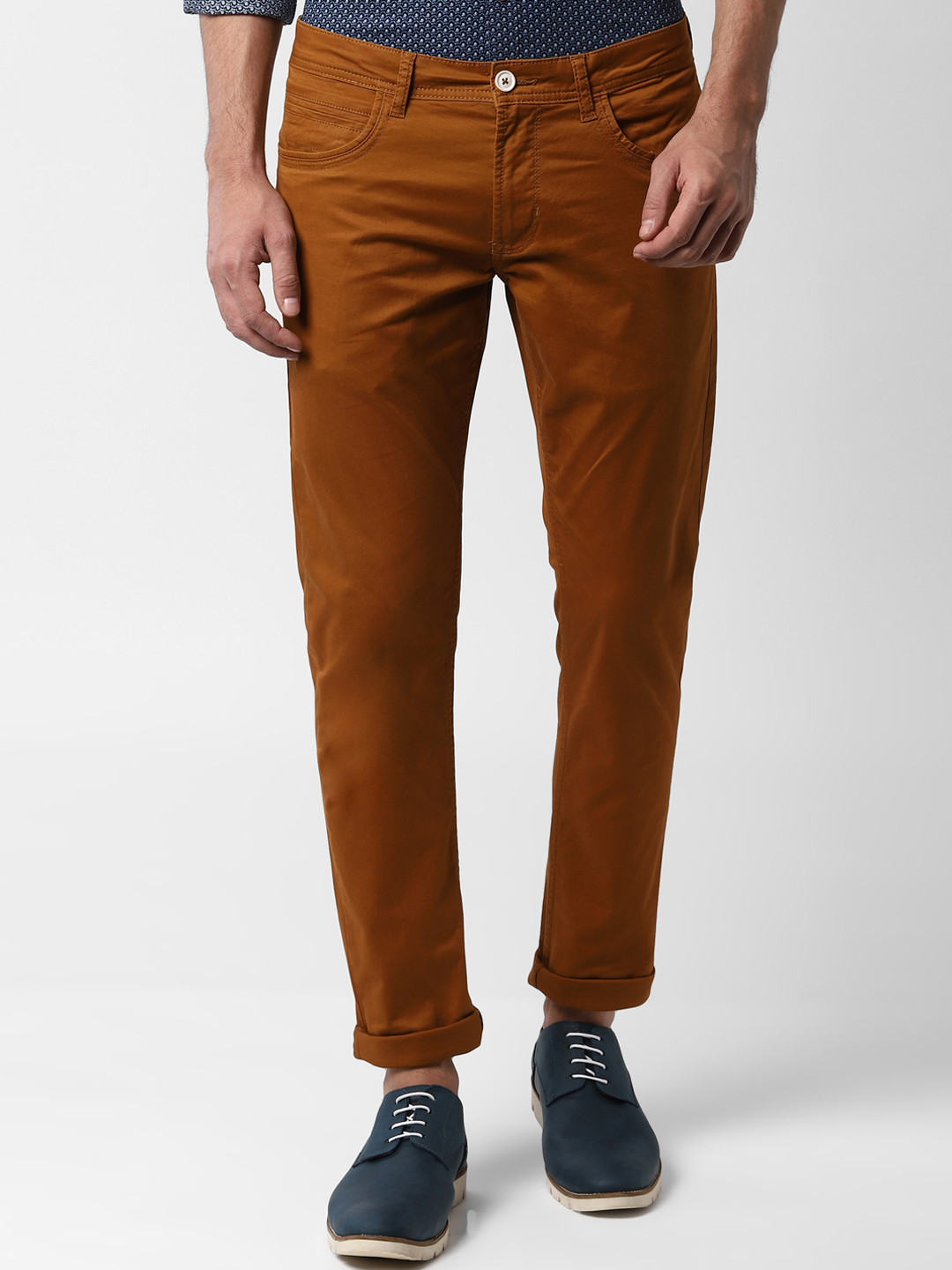 

Peter England Casuals Men Brown Skinny Fit Solid Regular Trousers