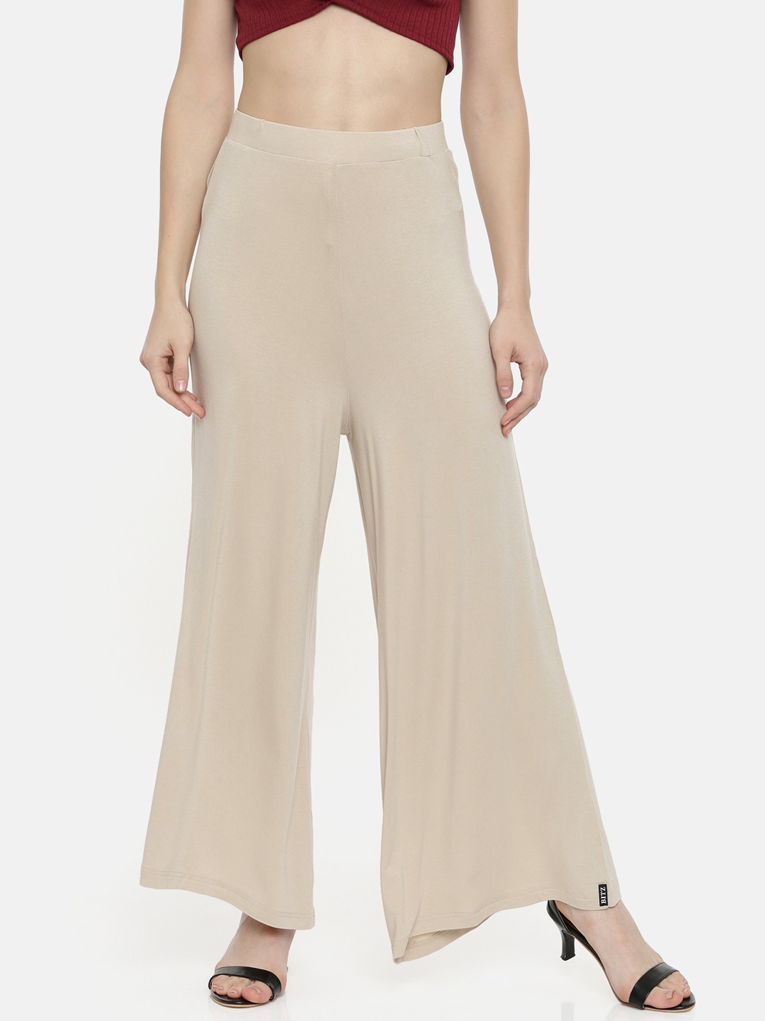 

Bitz Women Beige Solid Flared Palazzos