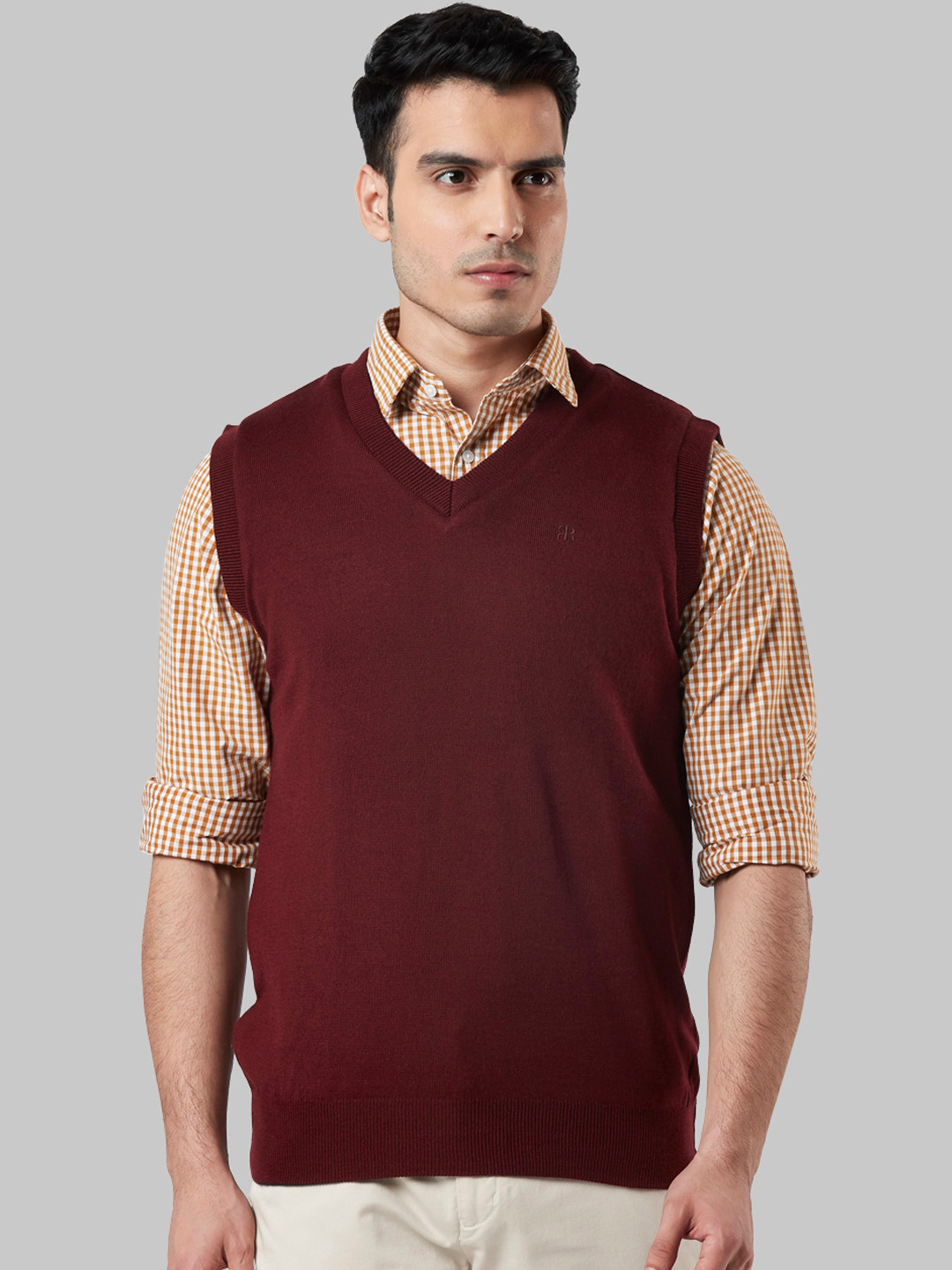 

Raymond Men Maroon Solid Sweater Vest Sweater
