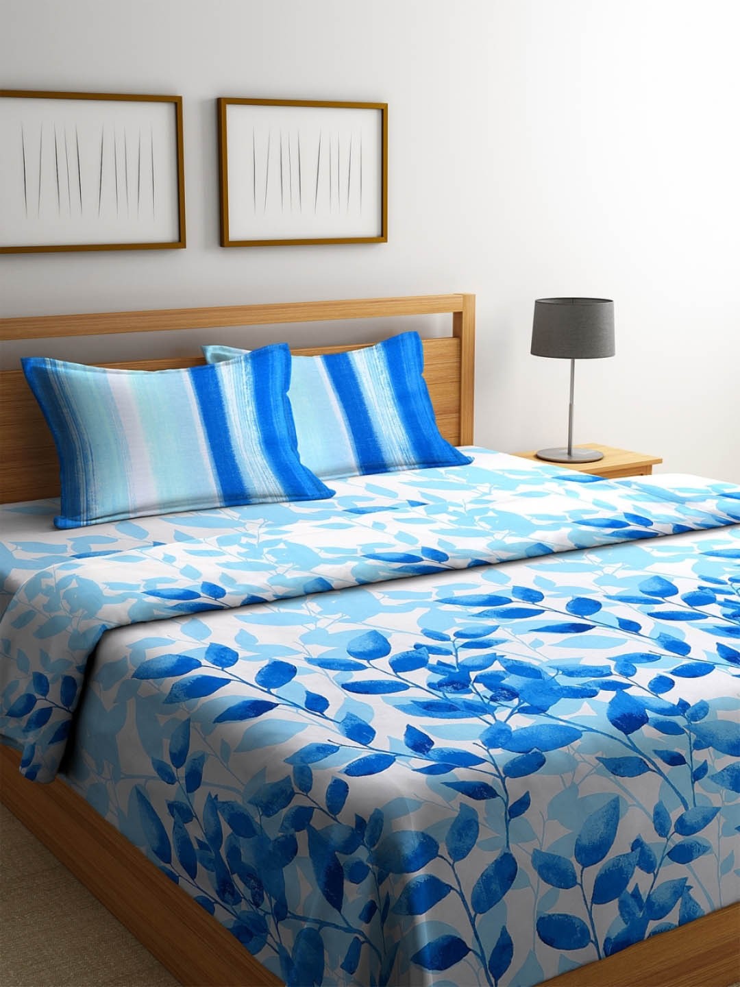 

ROMEE White & Blue Floral Printed Reversible AC Comforter with Bedsheet and 2 Pillow Covers