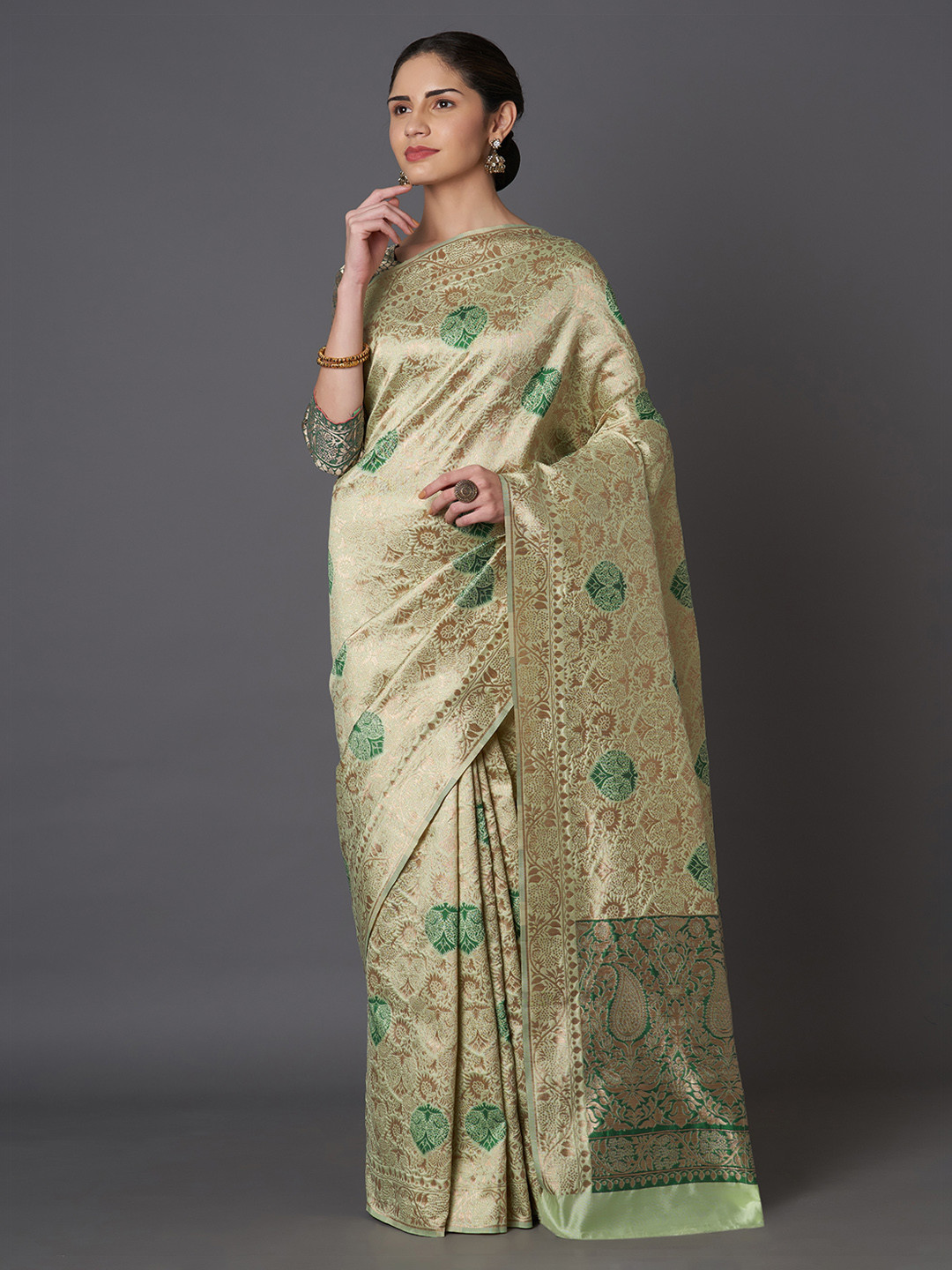 

Mitera Olive Green & Rose Gold Silk Blend Woven Design Kanjeevaram Saree