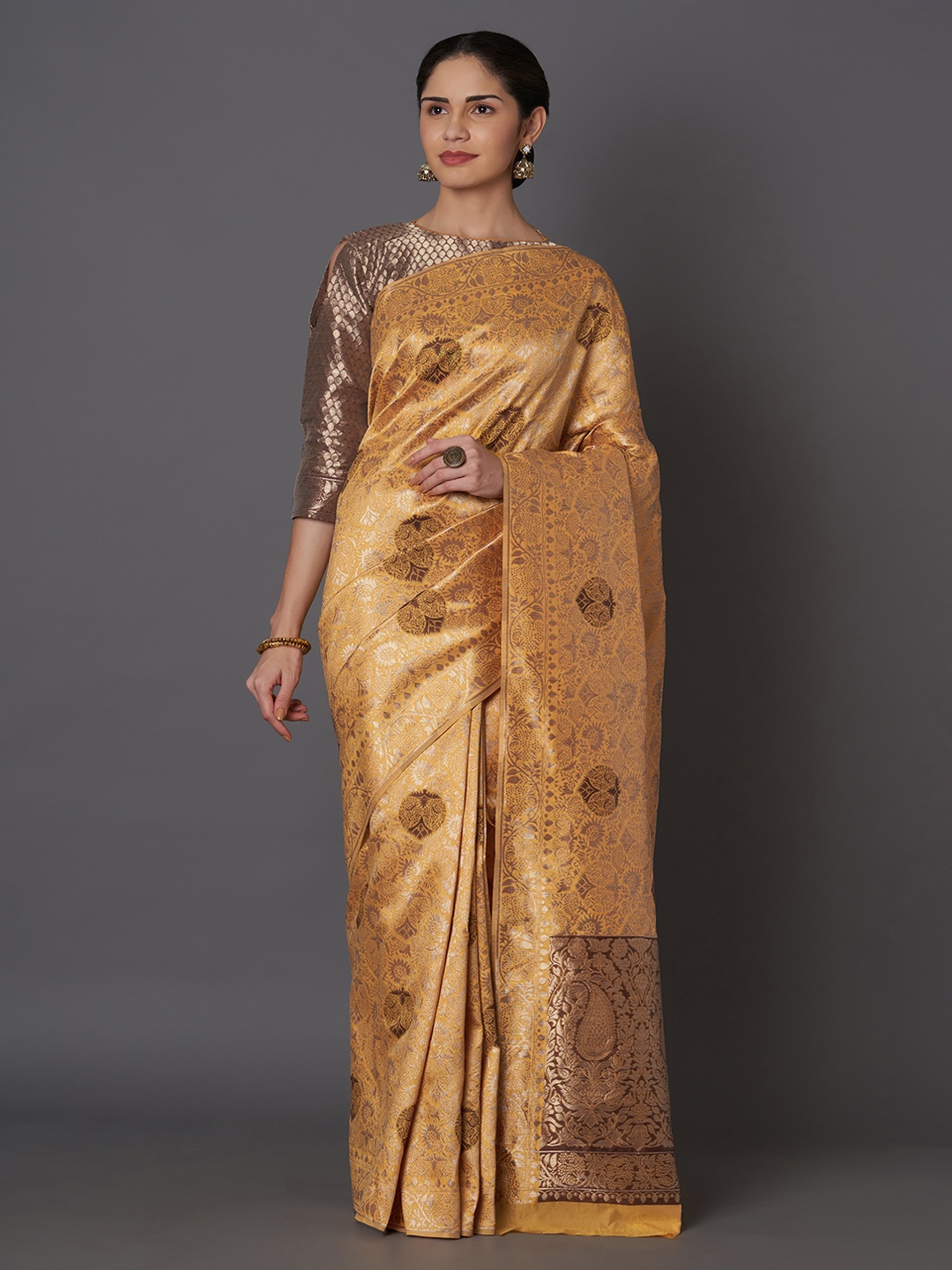 

Mitera Gold-Coloured Silk Blend Woven Design Kanjeevaram Saree