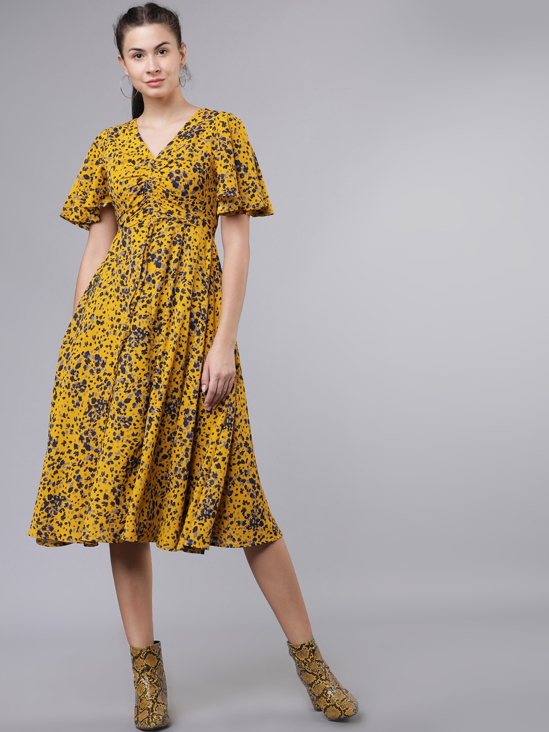 

Tokyo Talkies Women Mustard Yellow Printed Fit and Flare Dress