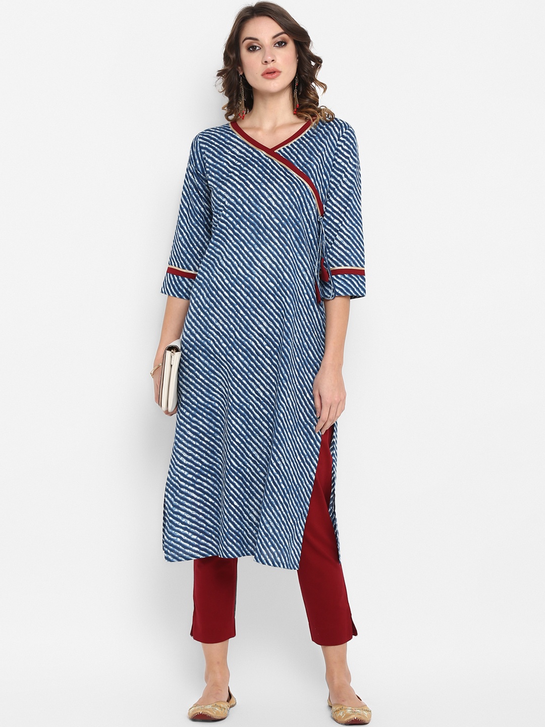 

Janasya Women Blue & Maroon Striped Kurta with Trousers