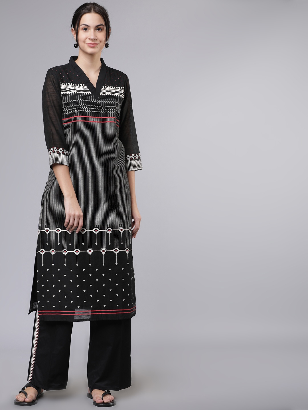 

Vishudh Women Black Printed Kurta with Palazzos