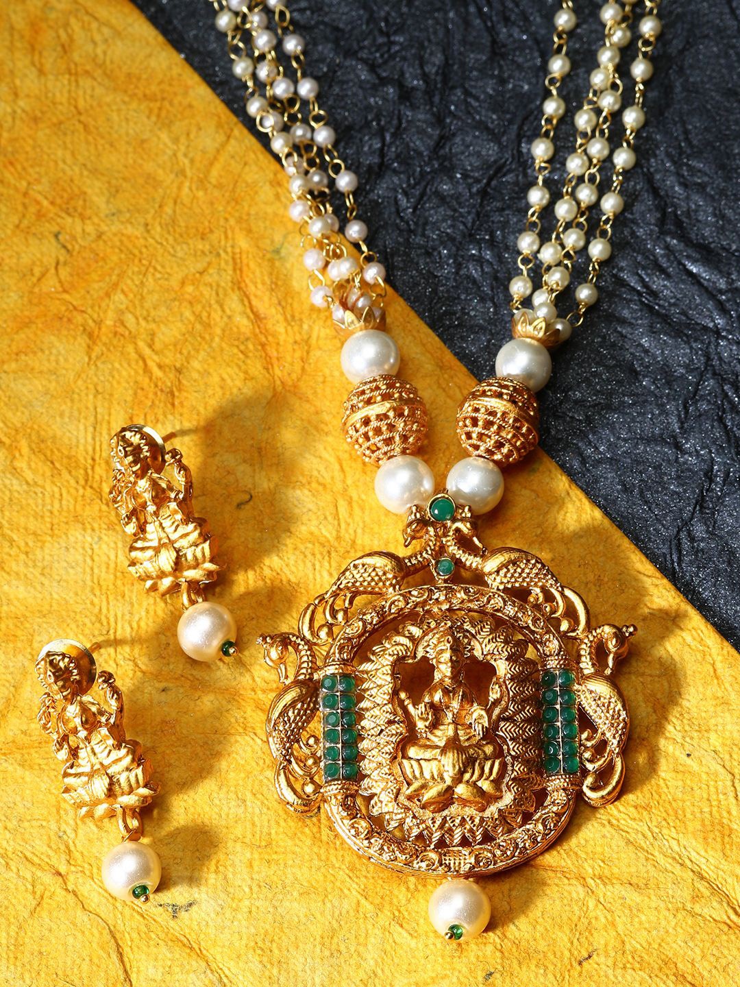 

ANIKAS CREATION Gold-Plated & Green Stone-Studded Pearl Beaded Gold-Plated Maa Laxmi Temple Jewellery Set