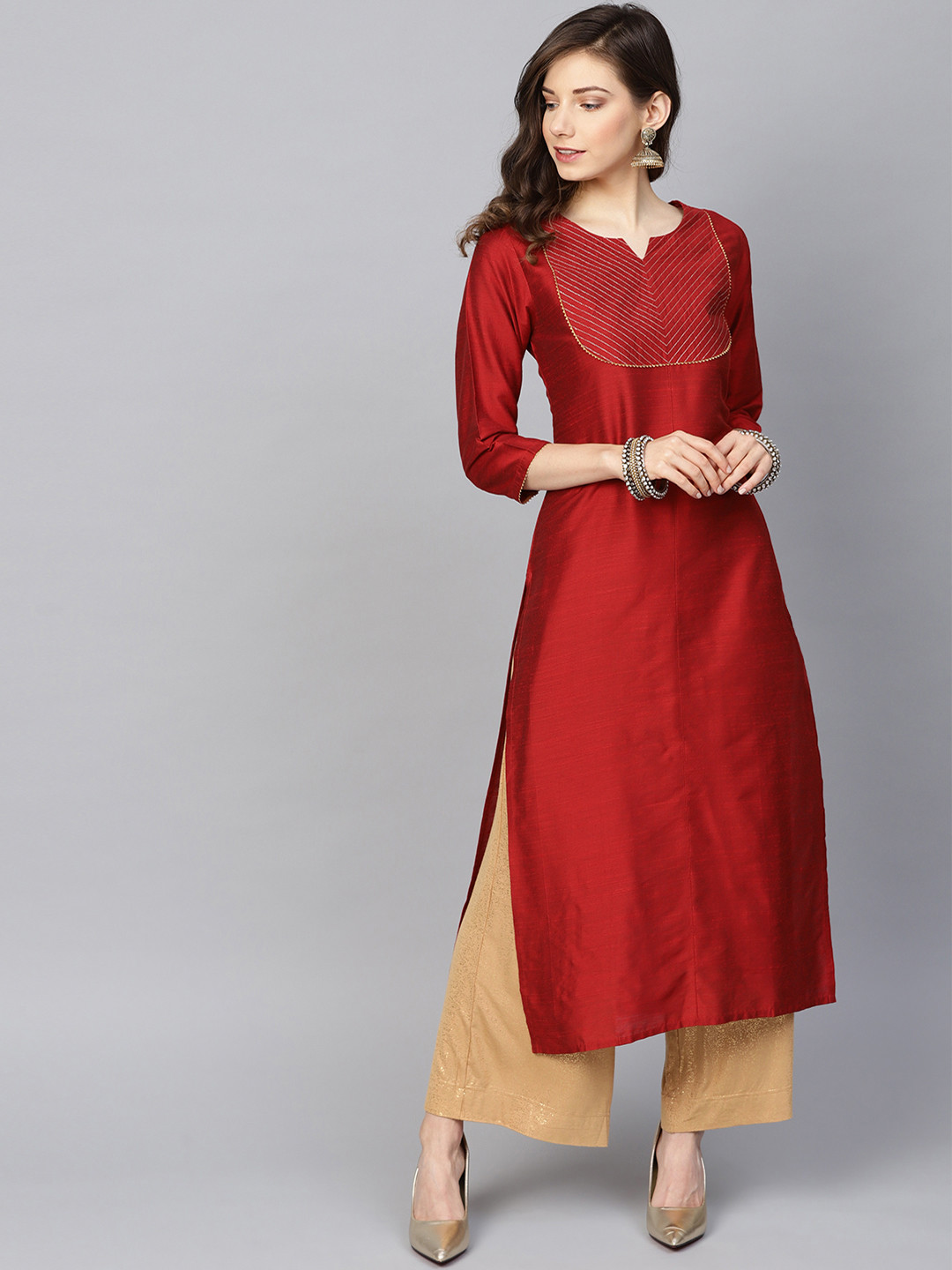 

Varanga Women Maroon Solid Straight Kurta