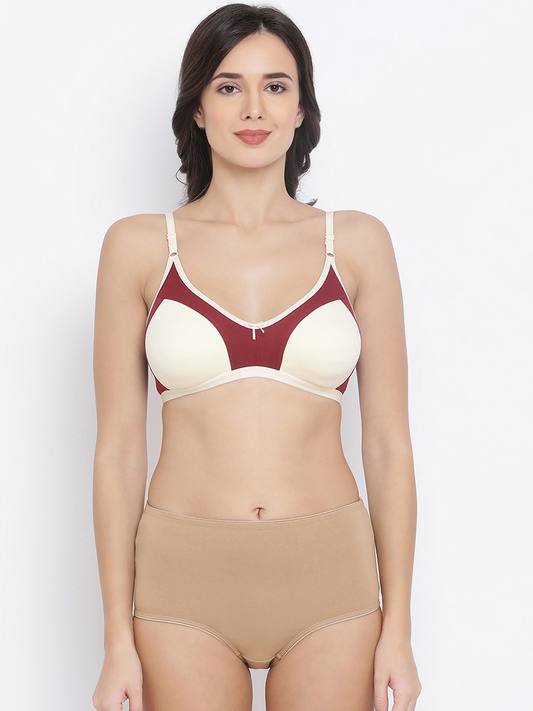 

Clovia Women Maroon & Beige Solid Lingerie Set COMBBP39832B