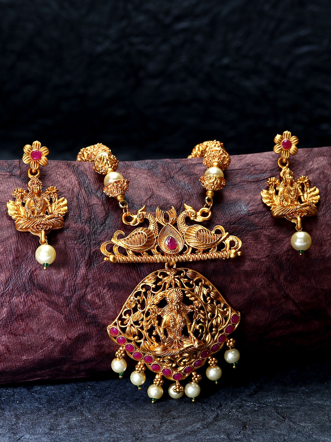 

ANIKAS CREATION Gold-Plated & Red Stone-Studded Maa Laxmi Temple Jewellery Set