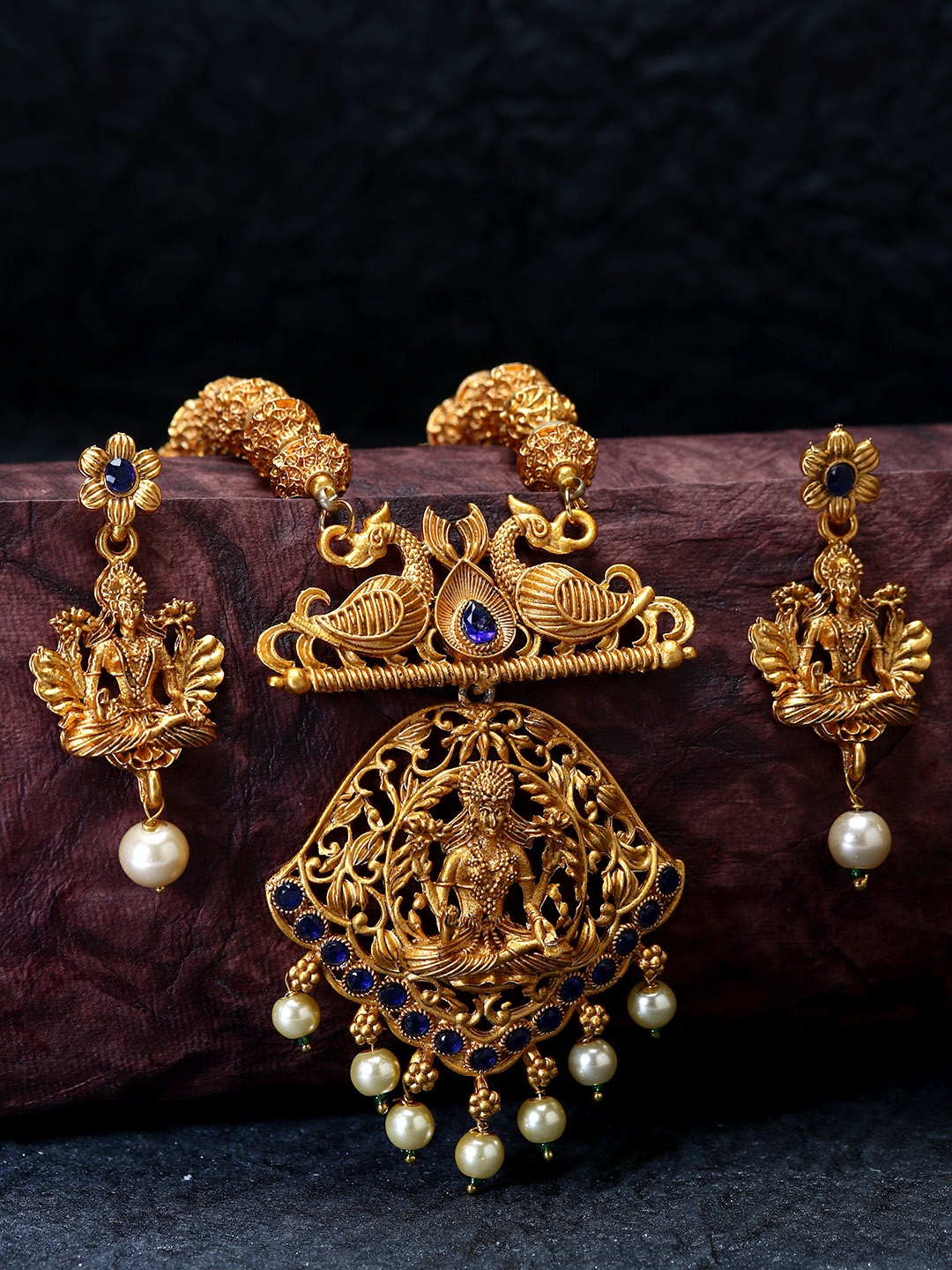 ANIKAS CREATION Gold-Plated & Navy Blue Stone-Studded Maa Laxmi Temple Jewellery Set