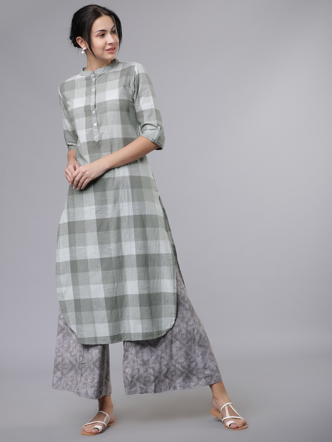 

Vishudh Women Grey Printed Kurta with Palazzos