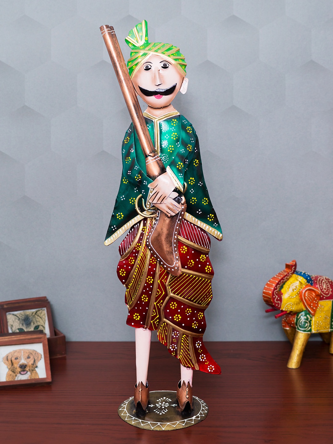 

Golden Peacock Red & Green Handcrafted Metal Indian Village Man Showpiece
