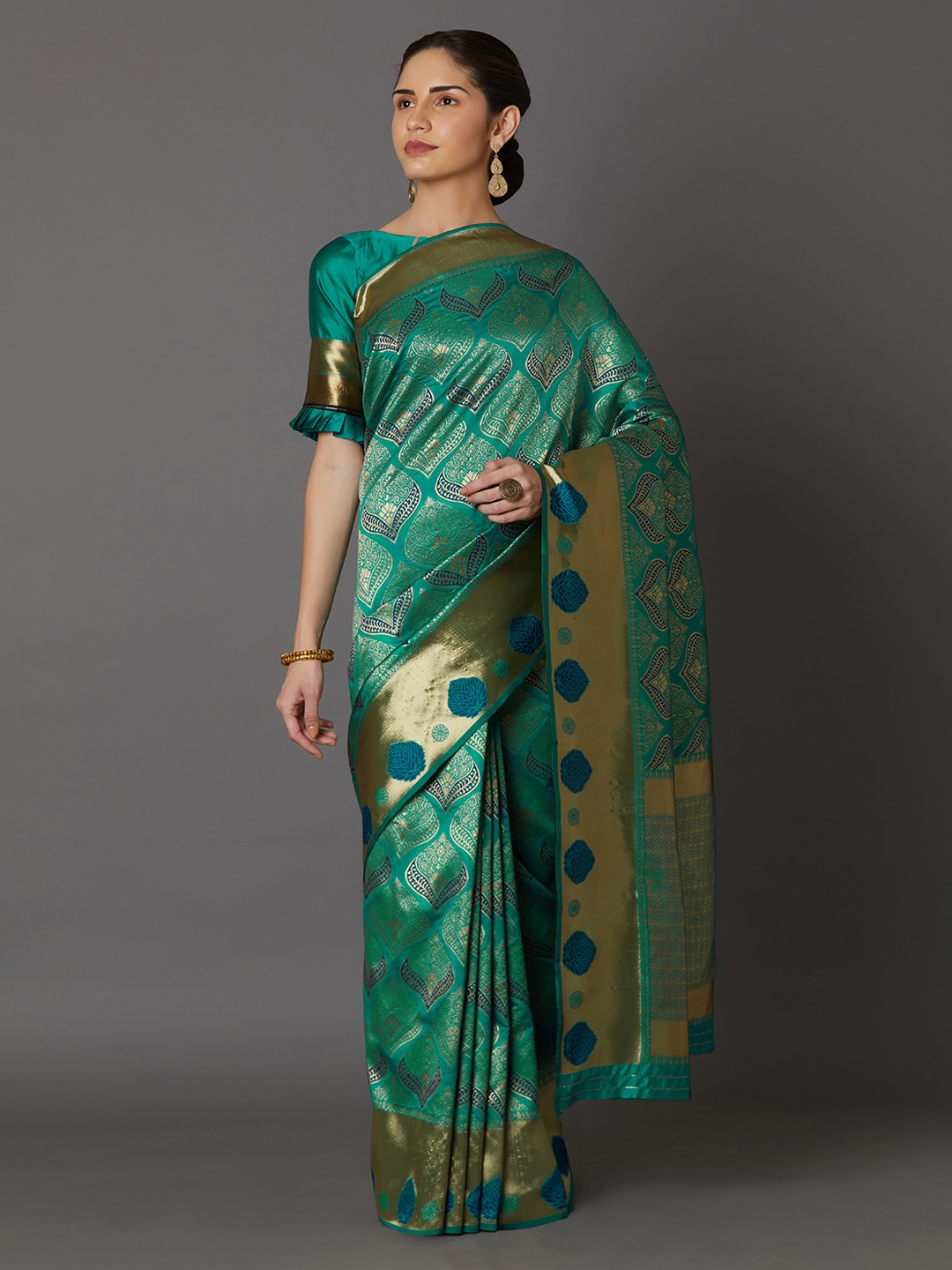 

Mitera Teal Silk Blend Woven Design Kanjeevaram Saree