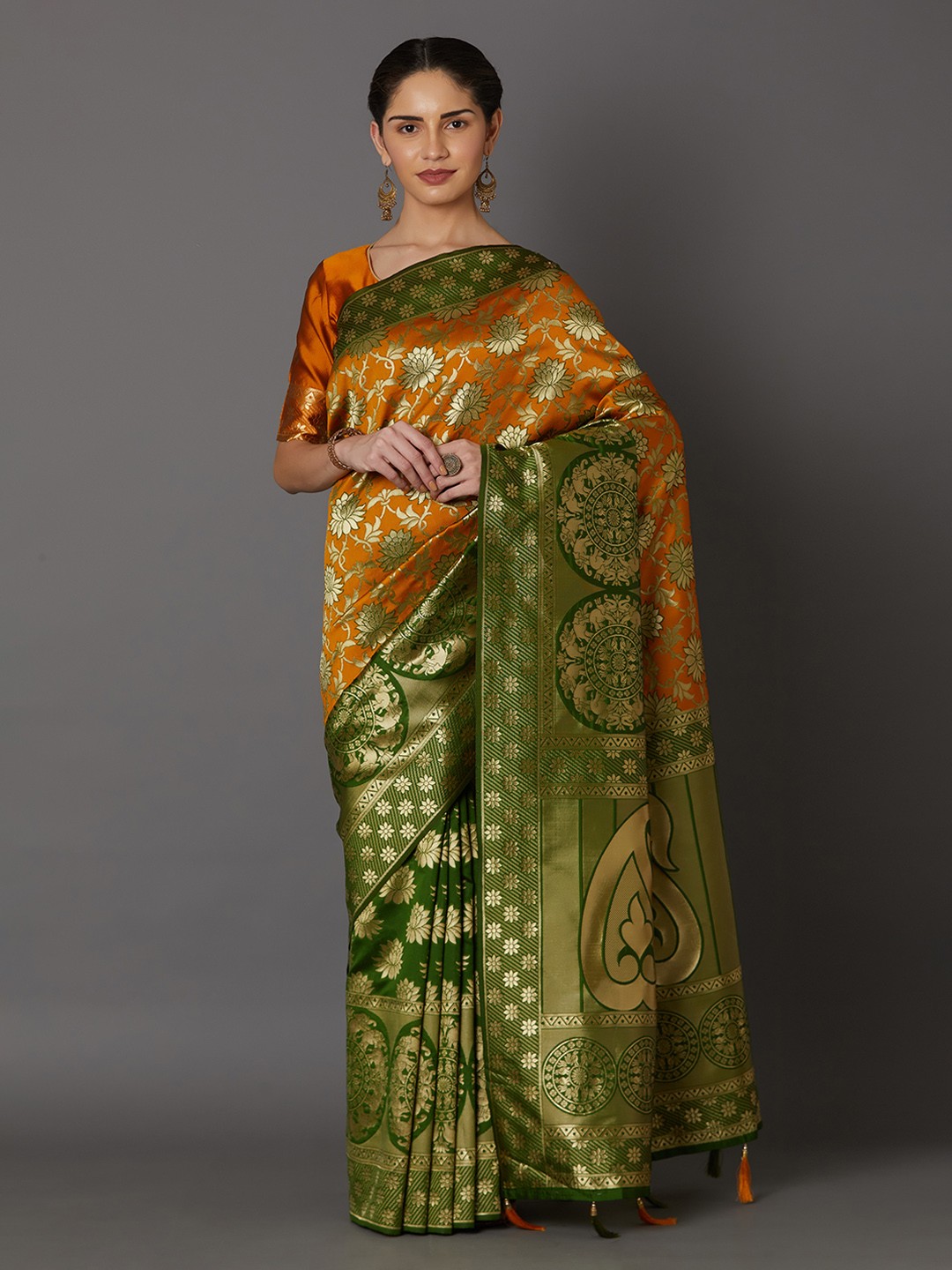 

Mitera Orange & Green Silk Blend Woven Design Kanjeevaram Saree