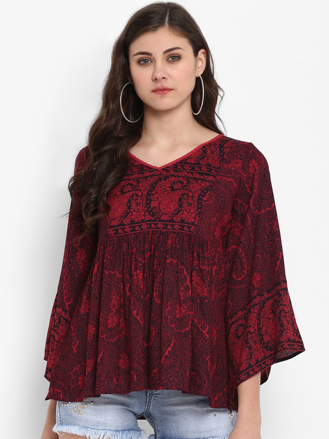 

Taurus Women Red Printed Empire Top