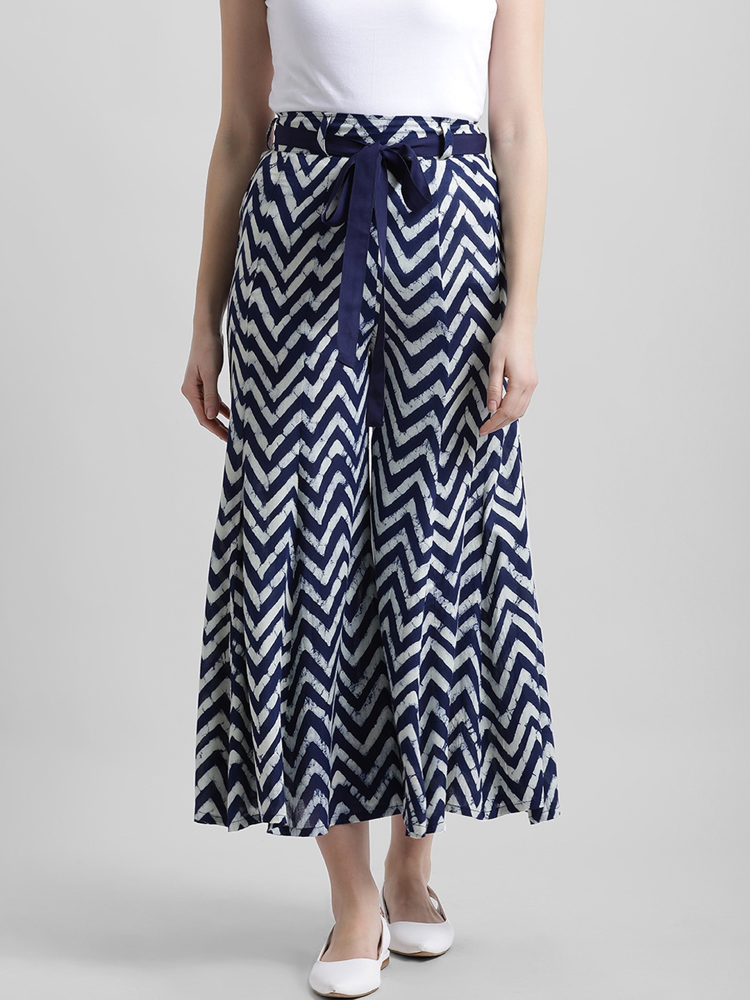 

Azira Women White & Blue Printed Flared Palazzos