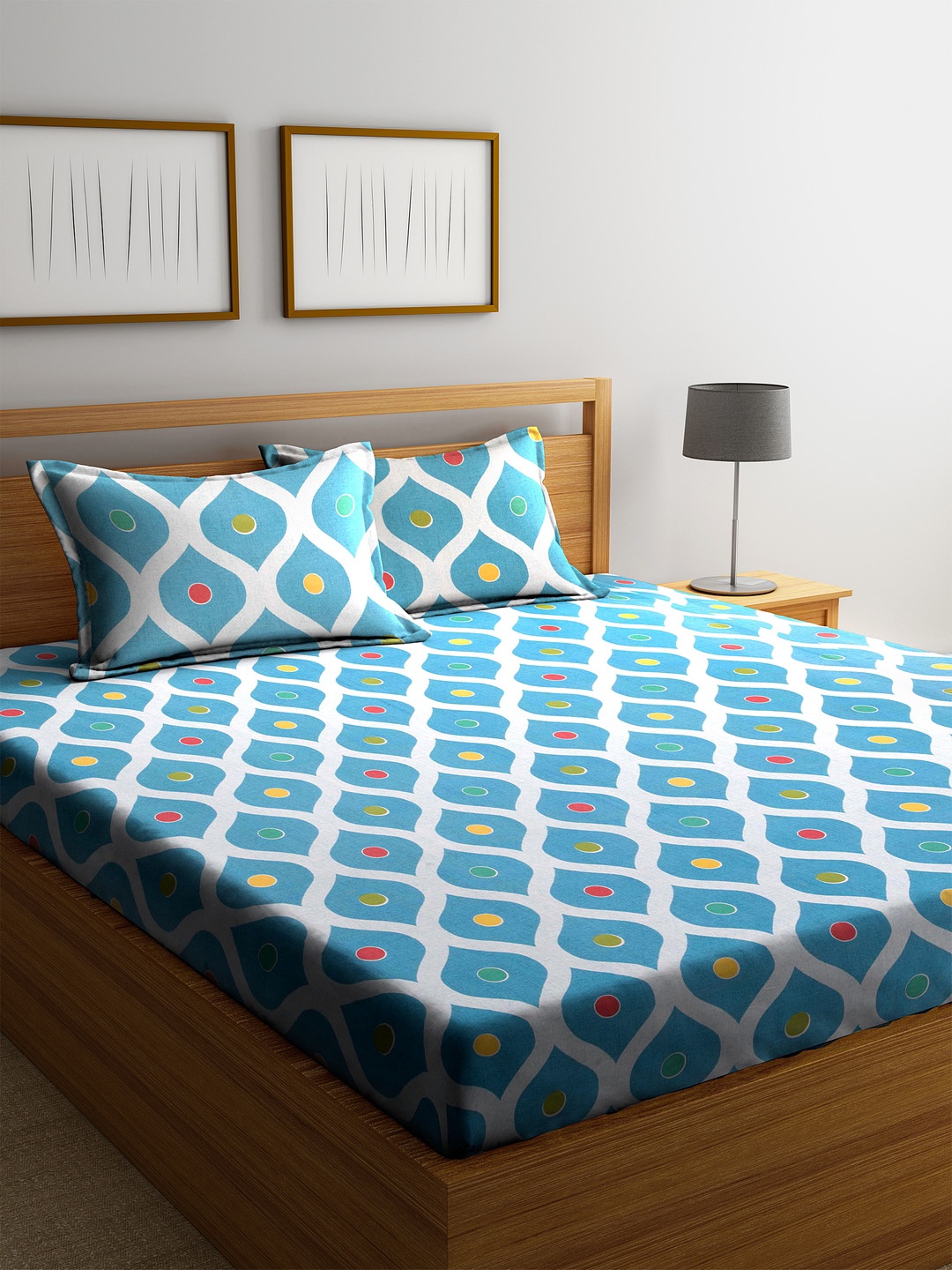 

Cortina Blue & White Ethnic Motifs 120 TC Cotton 1 Queen Bedsheet with 2 Pillow Covers