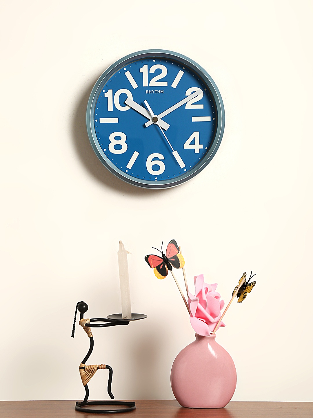 

Rhythm Unisex Blue Handcrafted Round Solid Analogue Wall Clock CMG890GR04