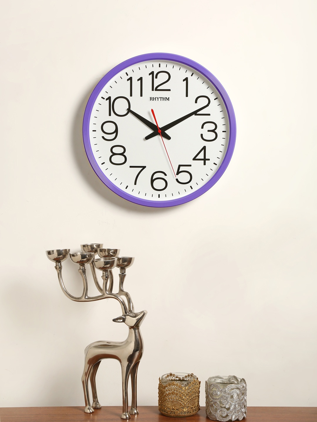 

Rhythm White & Purple Handcrafted Round Solid Analogue Wall Clock