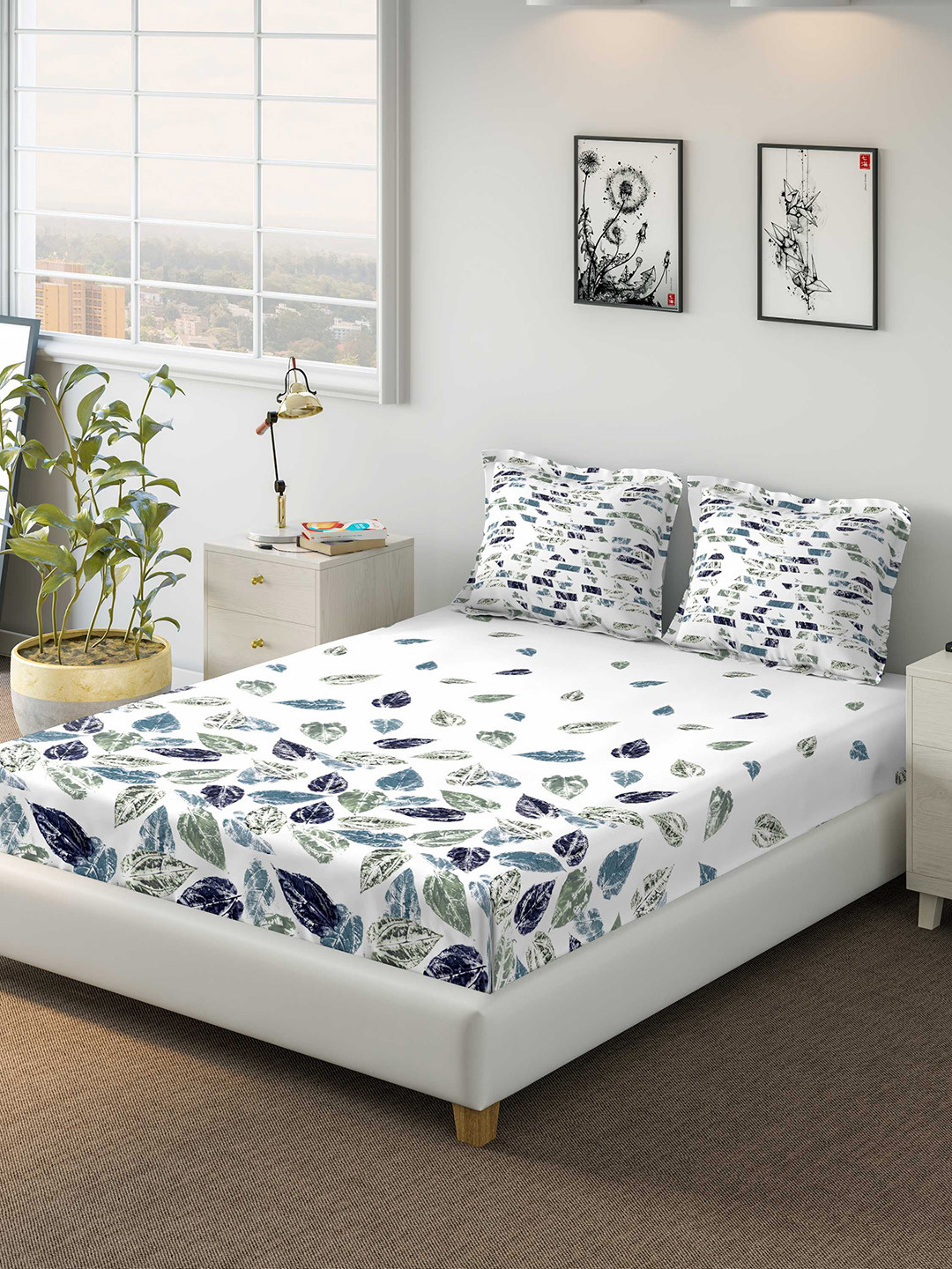 

DDecor Blue Floral 130 TC Cotton 1 Queen Bedsheet with 2 Pillow Covers