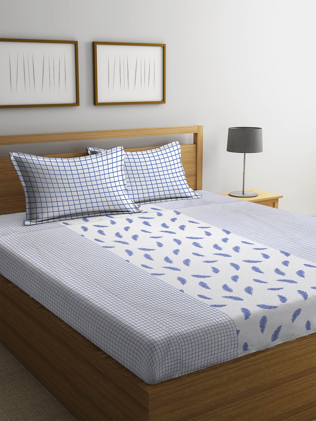 

Cortina White & Blue Floral 120 TC Cotton 1 Queen Bedsheet with 2 Pillow Covers