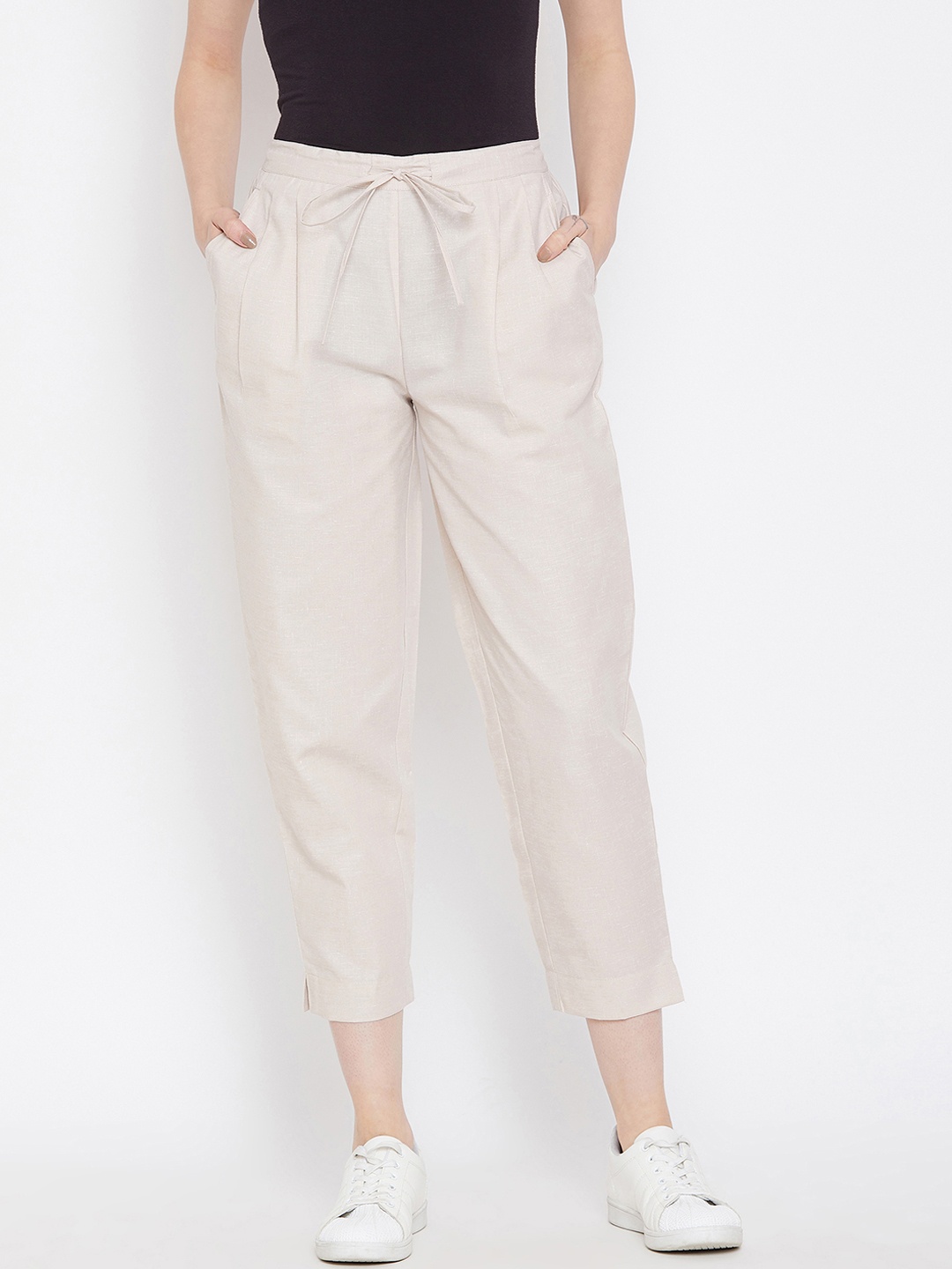 

Bitterlime Women Beige Relaxed Regular Fit Self Design Cropped Peg Trousers