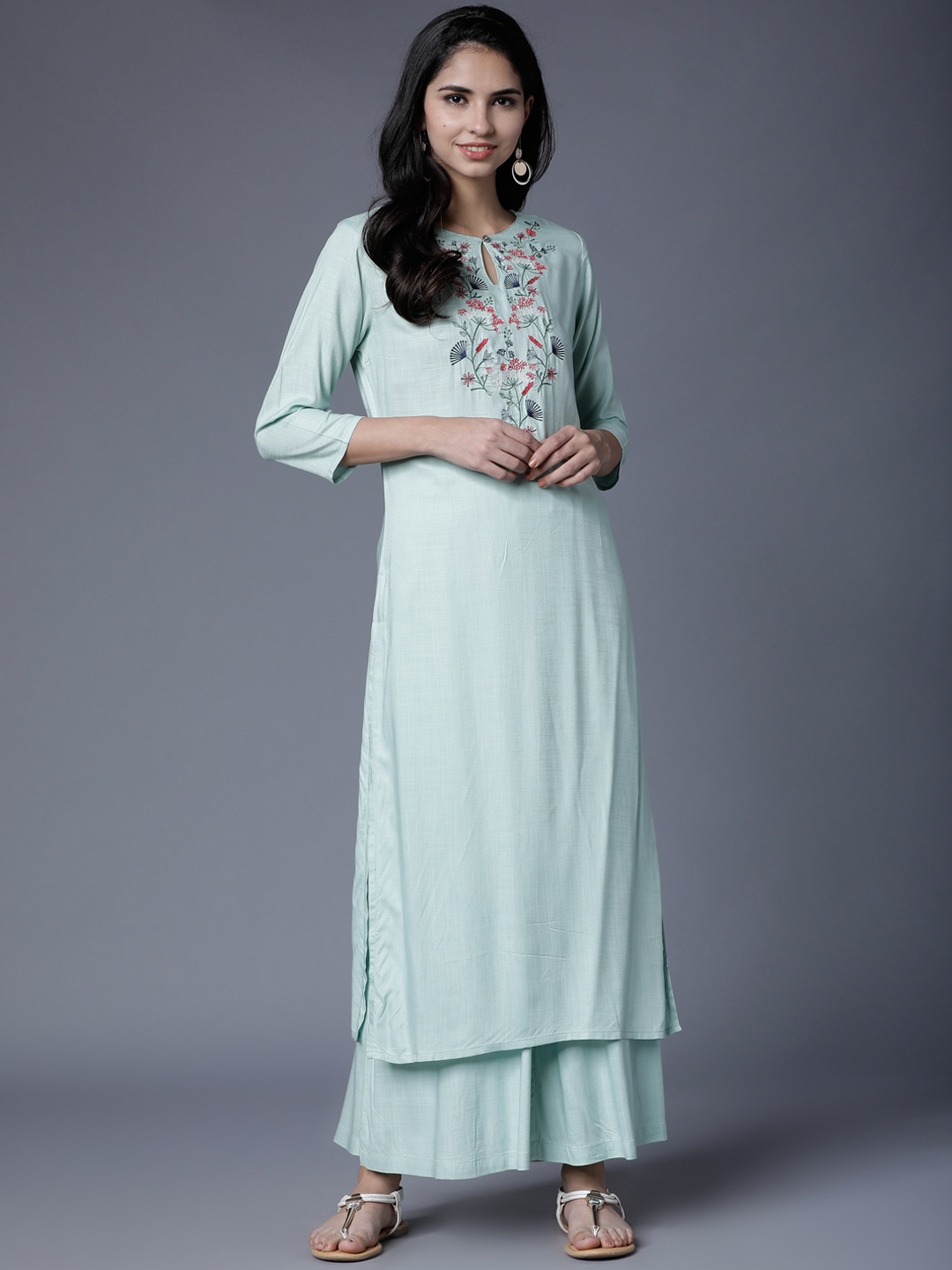 

Vishudh Women Sea Green Embroidered Kurta with Palazzos