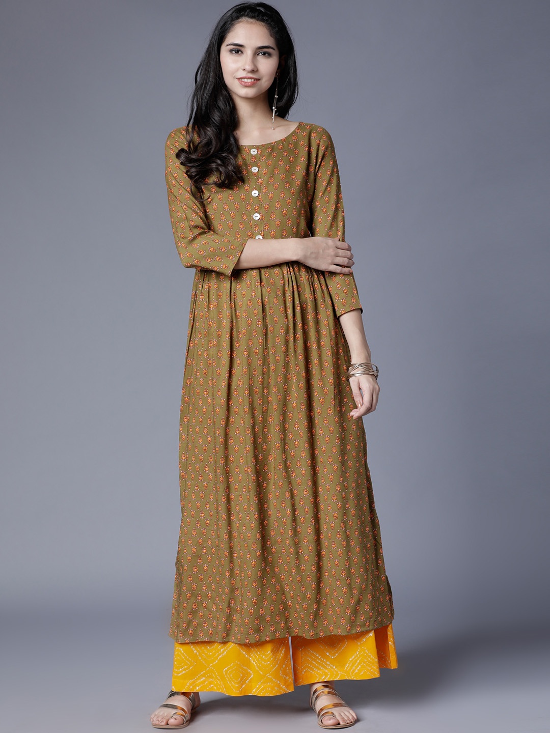 

Vishudh Women Yellow & Green Printed A-Line Kurta