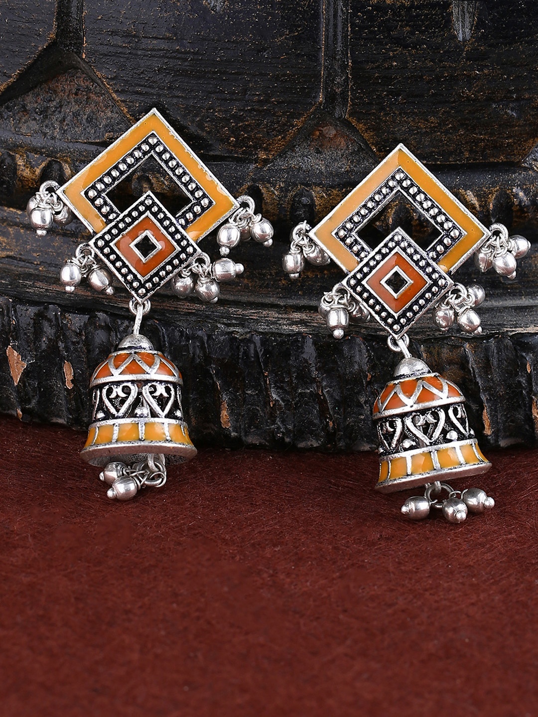 

Voylla Oxidised Silver-Plated & Orange Diamond Shaped Jhumkas