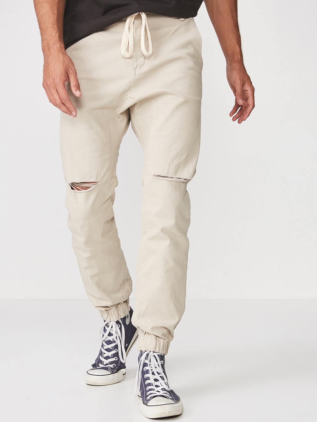 

COTTON ON Men Beige Slim Fit Solid Joggers