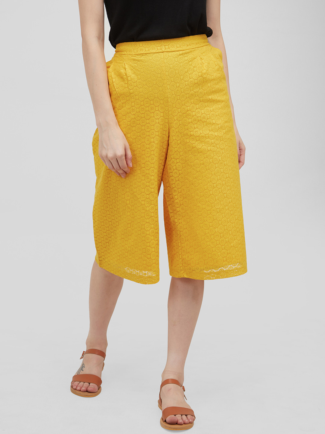 

Mystere Paris Women Yellow Loose Fit Self Design Regular Trousers