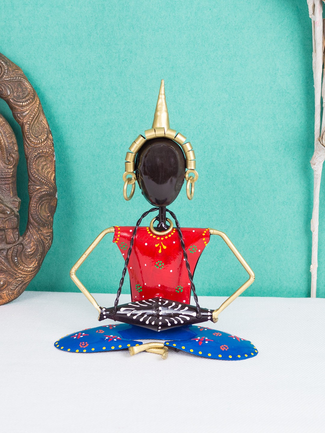 

Golden Peacock Multicoloured Handcrafted Nepali Musician Showpiece, Multi