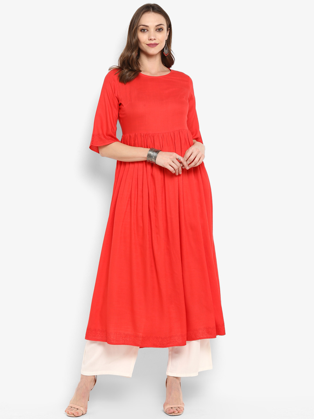 

Meeranshi Women Coral Orange Solid Anarkali Kurta