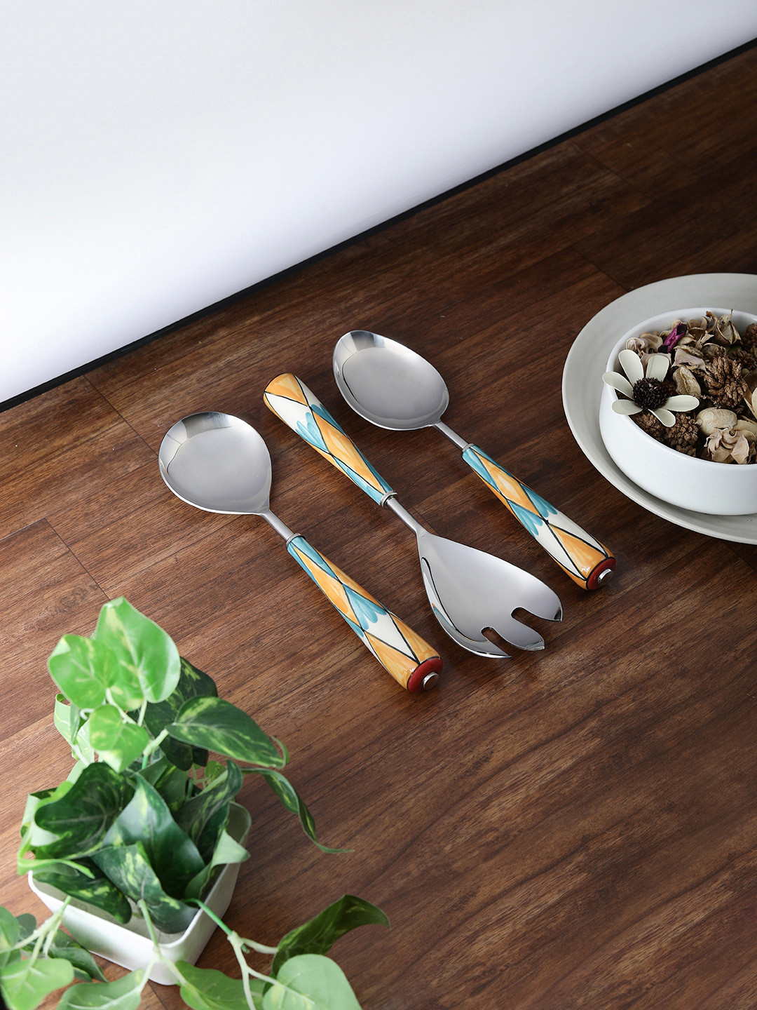 

VarEesha Orange Printed Stainless Steel Set