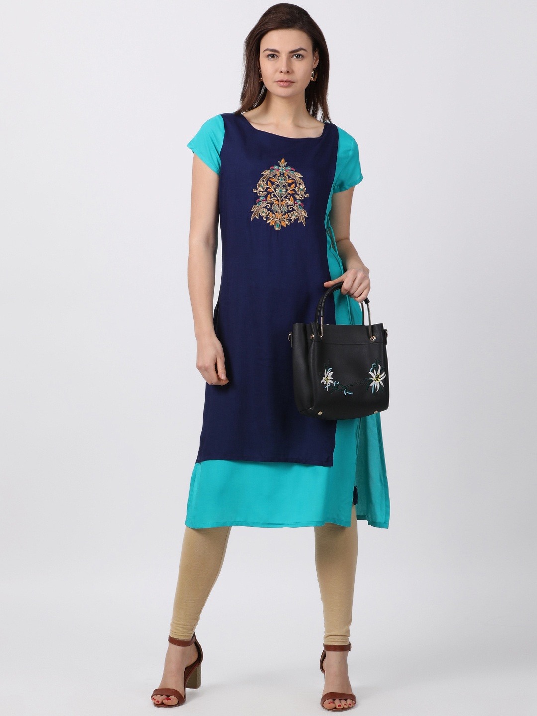 

Alena Women Blue Solid Straight Kurta