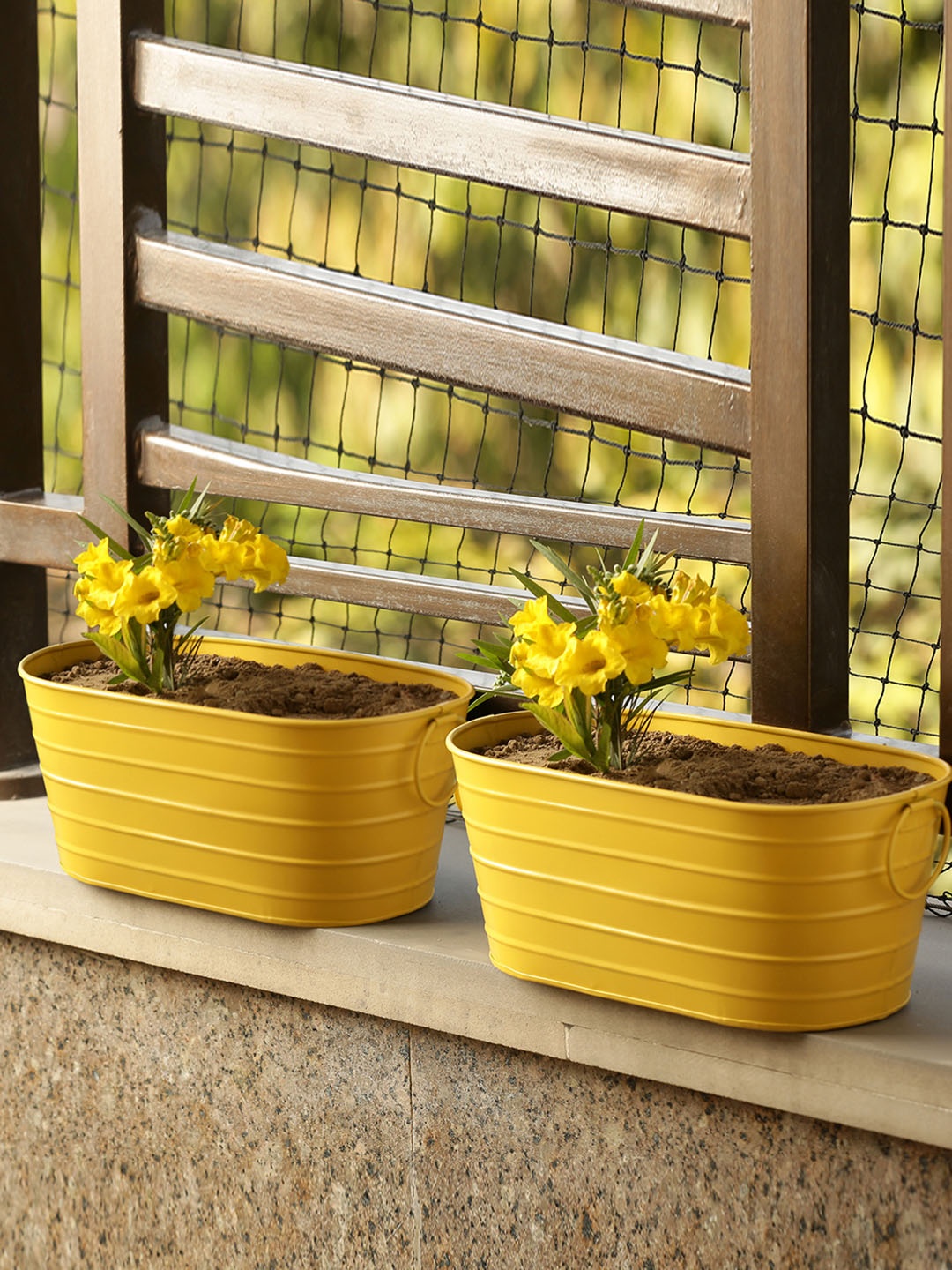 

ExclusiveLane Set of 2 Yellow Solid Hand-Painted Glossy Floor Cum Table Planters