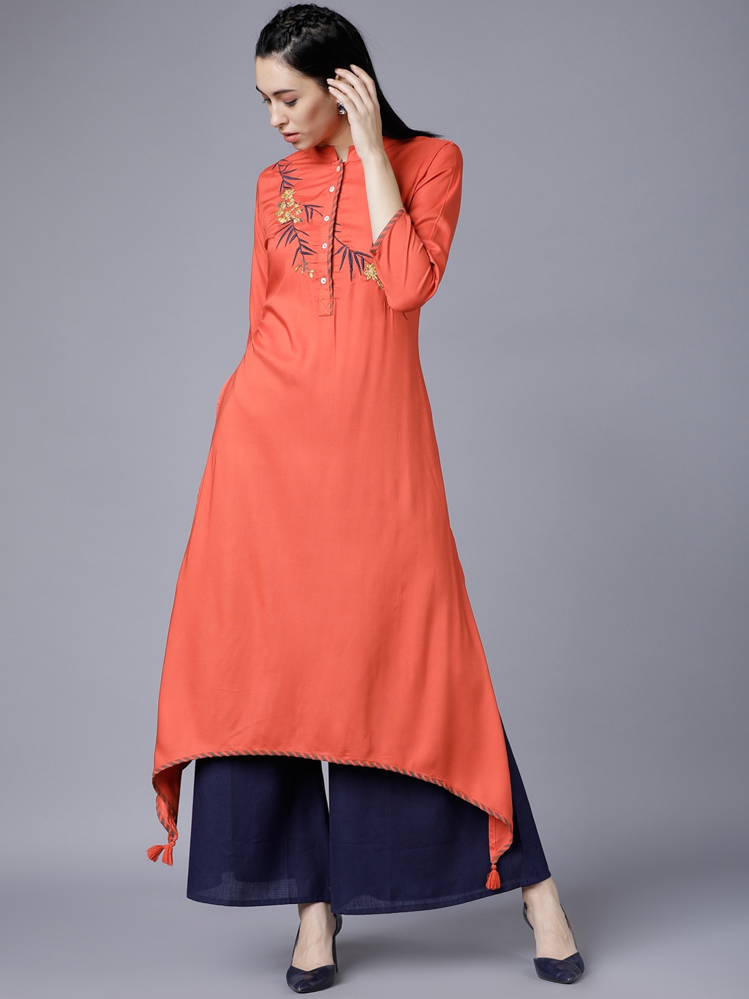 

Vishudh Women Rust Orange Embroidered Asymmetric A-Line Kurta