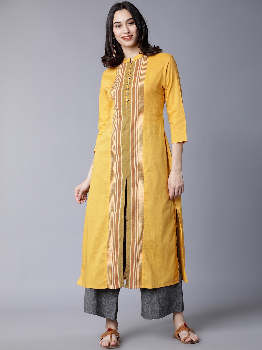 

Vishudh Women Mustard Yellow & Grey Striped Kurti with Palazzos