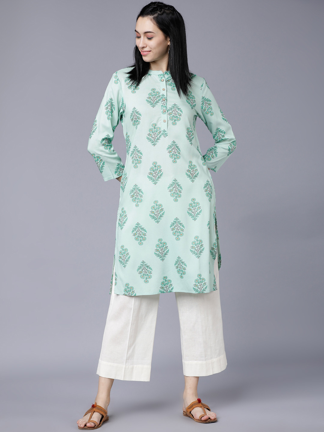 

Vishudh Women Blue & White Printed Straight Kurta