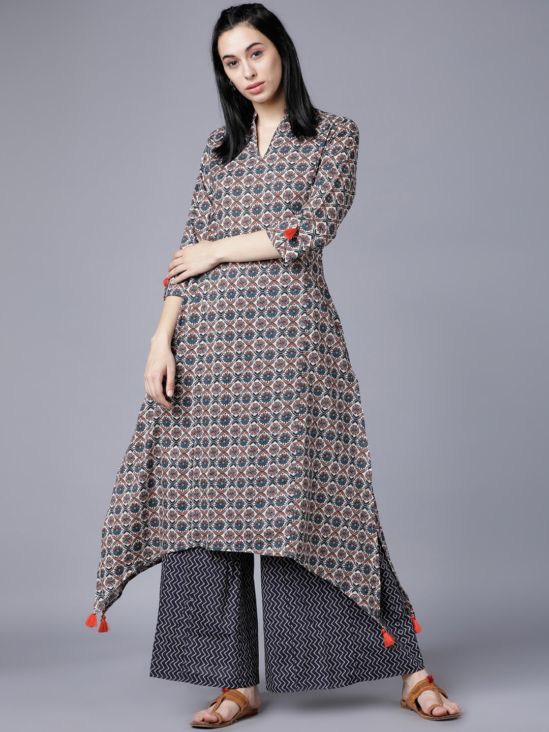 

Vishudh Women Teal Green & Beige Printed Kurta with Palazzos