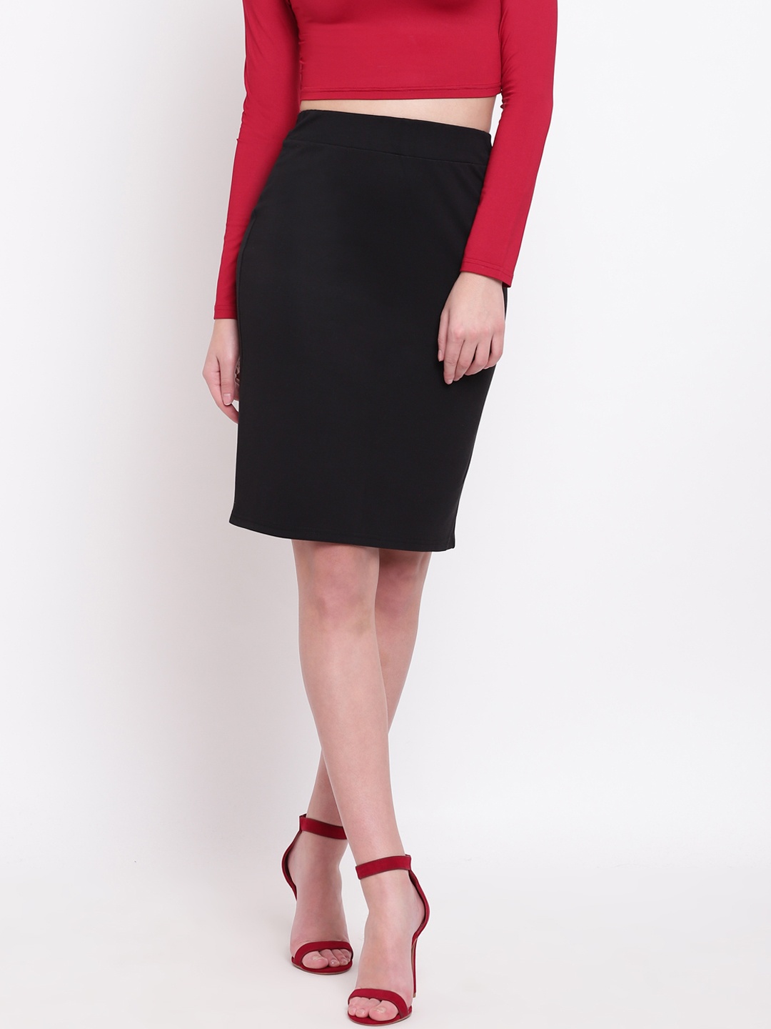 

RIVI Women Black Solid Straight Skirt
