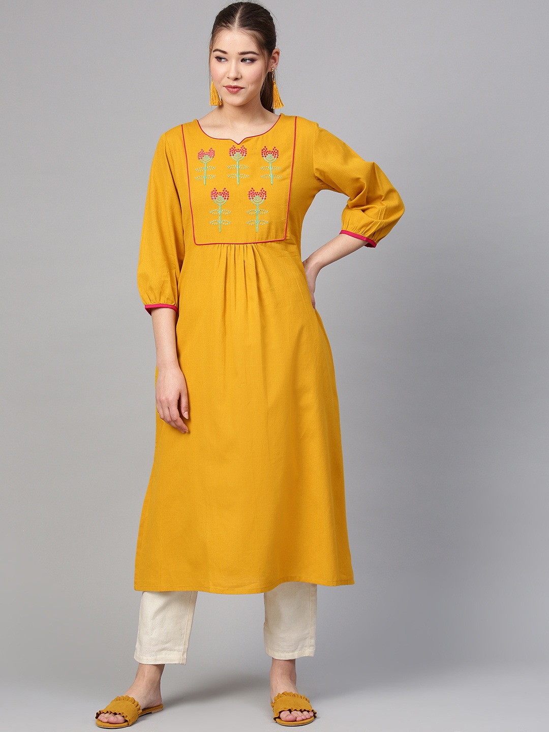 

Varanga Women Mustard Yellow Embroidered Straight Kurta